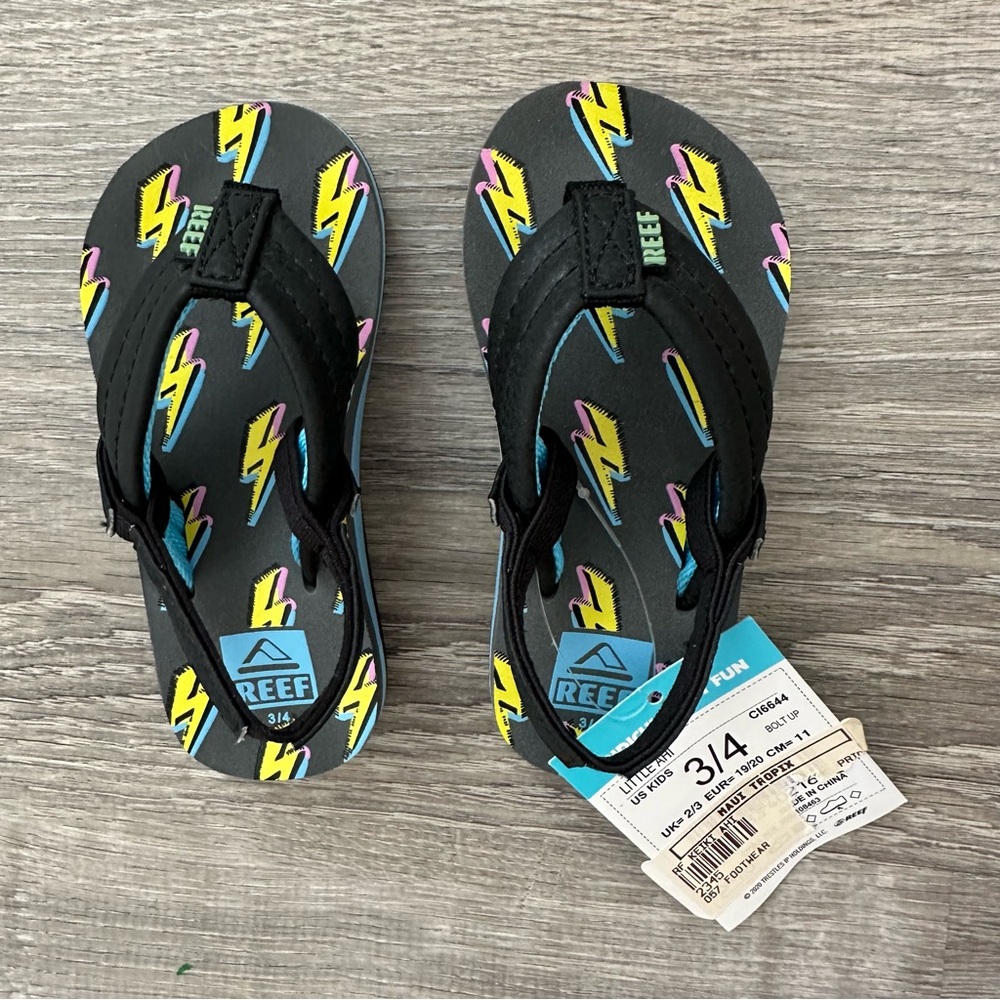 Reef Kids Black Flip Flops with Lightning Design